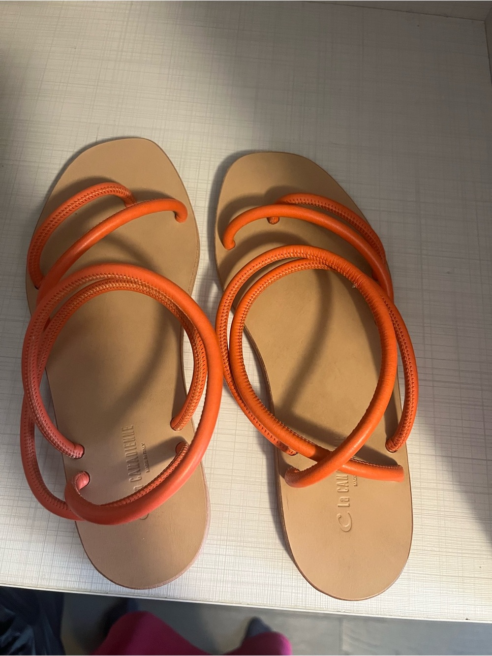 La CANADIENNE Orange Braided Strap Flat Sandals
